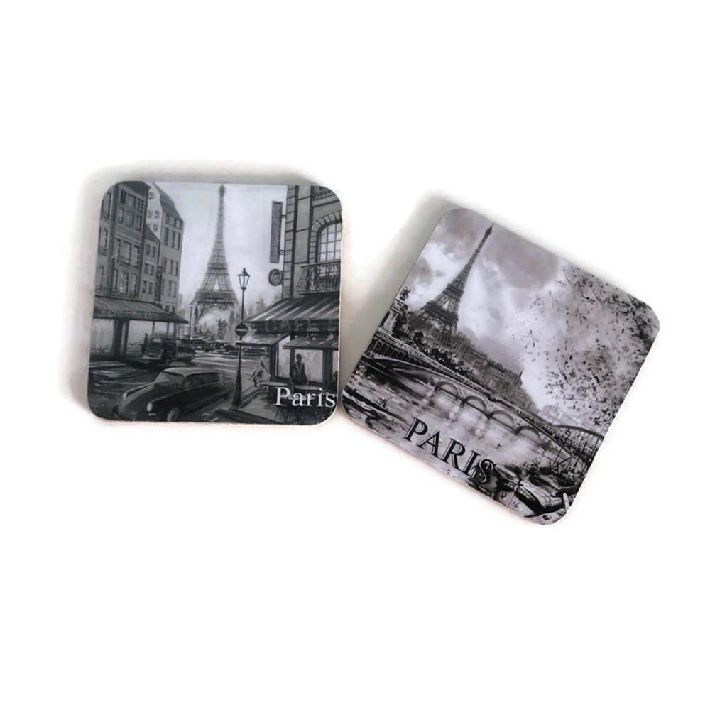 Coasters. A pair. Black and white from Paris. NWOT